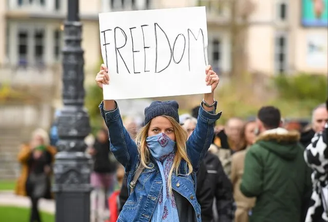 Anti-lockdown protesters march through the town centre on November 21, 2020 in Bournemouth, England. (Photo by Finnbarr Webster/Getty Images)
