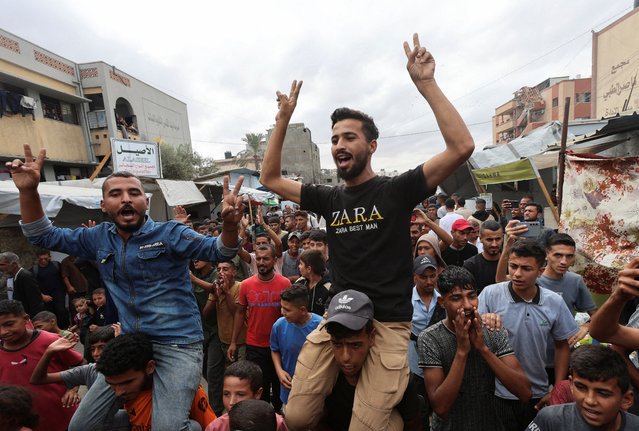 Palestinians celebrate after Israel and Hamas agreed on the first phase of a Gaza ceasefire, in Khan Younis in the southern Gaza Strip, on October 9, 2025. (Photo by Ramadan Abed/Reuters)