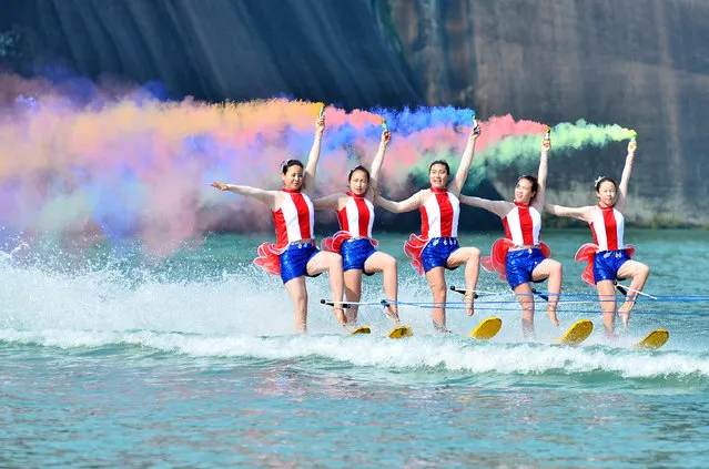 Participants give a performance on a river during a showcase at a tourism resort in Chenzhou, Hunan Province, China, November 6, 2016. (Photo by Reuters/Stringer)