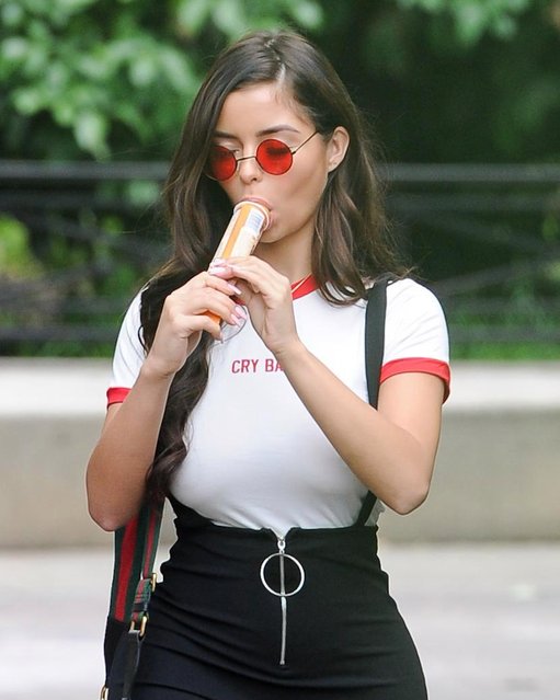 Demi Rose sucked on an ice pole during a visit to London Zoo on Tuesday, June 12, 2018 in London, England. (Photo by KP Pictures)