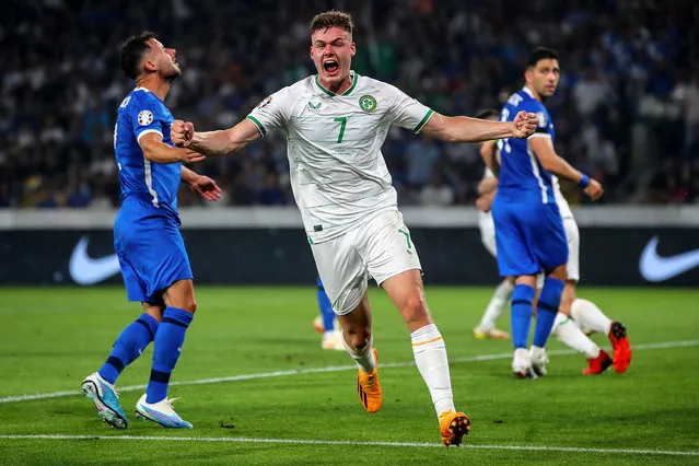 Evan Ferguson of Republic of Ireland celebrates his side's first goal, scored by teammate Nathan Collins, not pictured, during the UEFA EURO 2024 Championship qualifying group B match between Greece and Republic of Ireland at the OPAP Arena in Athens, Greece. (Photo by Ryan Byrne/INPHO)