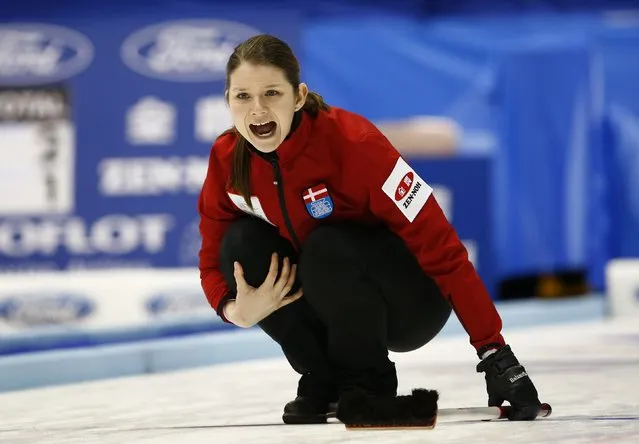 Denmark's skip Lene Nielsen instructs her team mates during their curling round robin game against Scotland at the World Women's Curling Championships in Sapporo March 14, 2015. (Photo by Thomas Peter/Reuters)