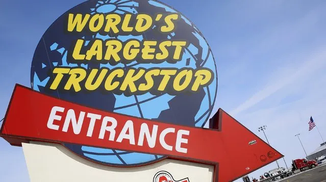 The road entrance to the “World's Largest Truckstop” in Walcott, Iowa, March 6, 2015. (Photo by Jim Young/Reuters)