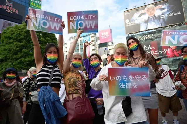 People take part in a rally organised by an activist group to support the LGBT legislation in Shibuya district of Tokyo on June 6, 2021. (Photo by Philip Fong/AFP Photo)