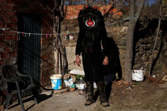 A man wearing a “El Diablo” (The Devil) mask poses during the “Los Carochos” winter masquerade in Riofrio de Aliste, Spain, January 1, 2017. (Photo by Juan Medina/Reuters)