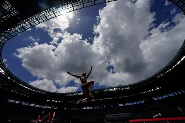 Malaika Mihambo, of Germany, competes in the women's long jump final at the 2020 Summer Olympics, Tuesday, August 3, 2021, in Tokyo. (Photo by David J. Phillip/AP Photo)