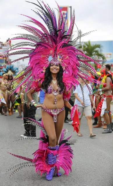A reveler takes part during the Jamaica Carnival Road march in Kingston April 12, 2015. (Photo by Gilbert Bellamy/Reuters)