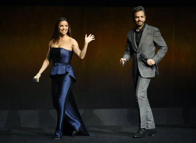 Eva Longoria, left, and Eugenio Derbez, cast members in the upcoming film “Dora and the Lost City of Gold”, appear during the Paramount Pictures presentation at CinemaCon 2019, the official convention of the National Association of Theatre Owners (NATO) at Caesars Palace, Thursday, April 4, 2019, in Las Vegas. (Photo by Chris Pizzello/Invision/AP Photo)