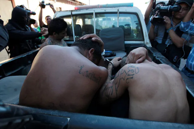 Members of the 18th Street Gang are presented to the media after being detained under charges of trafficking and robbery in Puerto El Triunfo, El Salvador, February 8, 2017. (Photo by Jose Cabezas/Reuters)