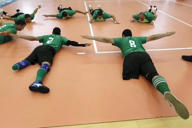 Colombia National Army soldiers, who were injured by mines, participate in the third sitting volleyball in Bello, municipality of Antioquia, Colombia May 17, 2015. According to the Mine Action Service of the United Nations, Colombia has the second highest number of landmine victims in the world, after Afghanistan. (Photo by Fredy Builes/Reuters)