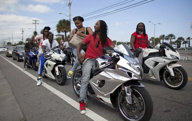 Bikers wait in traffic on Ocean Boulevard during the 2015 Atlantic Beach Memorial Day BikeFest in Myrtle Beach, South Carolina May 22, 2015. (Photo by Randall Hill/Reuters)
