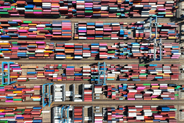Foreign trade containers are stacked at the container yard of Qingdao Port in east China's Shandong province, May 14, 2024. (Photo by CFOTO/Sipa USA)