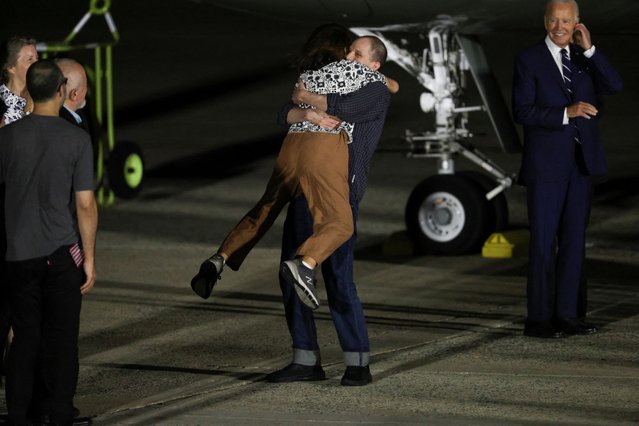 Evan Gershkovich who was released from detention in Russia, is greeted by his mother Ella Milman, upon his arrival at Joint Base Andrews in Maryland, U.S., August 1, 2024. (Photo by Kevin Mohatt/Reuters)