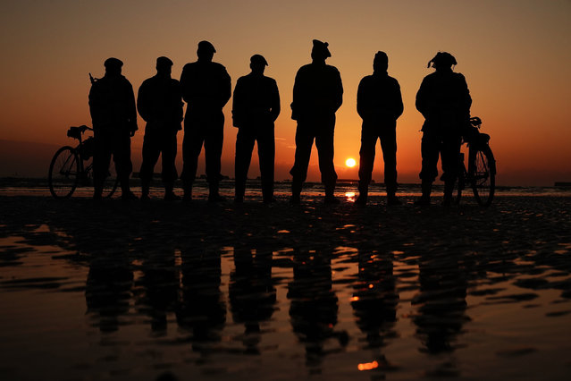 Re-enactors on Gold Beach in Arromanches at sunrise in Normandy, France, to commemorate the 80th anniversary of the D-Day landings on Thursday, June 6, 2024. (Photo by Aaron Chown/PA Images via Getty Images)