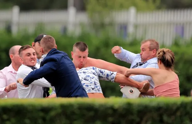 A large brawl breaks out as people leave the track after Sydney Racing at Rosehill Gardens on December 07, 2019 in Sydney, Australia. (Photo by Mark Evans/Getty Images)