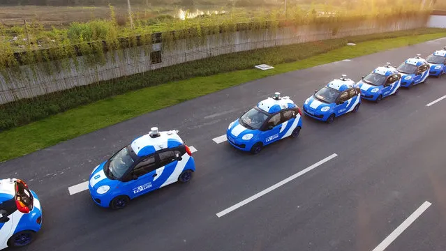 A fleet of vehicles equipped with Baidu’s autonomous driving technologies conduct road testing in Wuzhen, Zhejiang Province, China. (Photo by Reuters/Courtesy of Baidu)