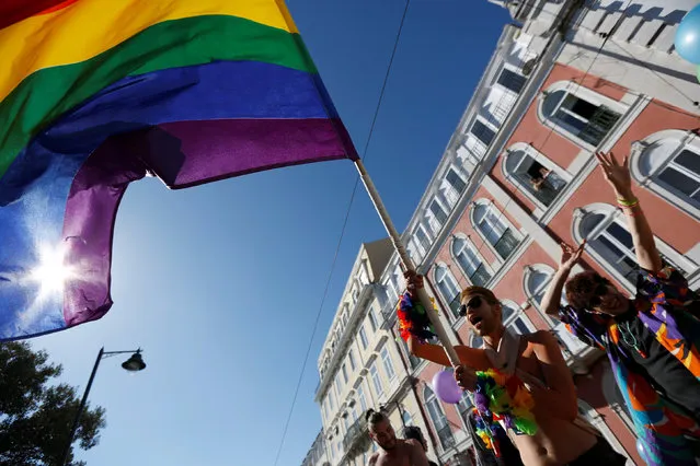 Participants march during a Gay Pride Parade in downtown Lisbon, Portugal June 18, 2016. (Photo by Rafael Marchante/Reuters)