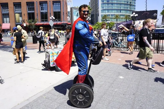 Superman cosplayer Kenneth Lipman rides on a Segway during Comic Con in San Diego, California, USA, 20 July 2017. (Photo by Nina Prommer/EPA)
