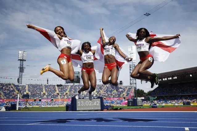 Silver medallists England's Asha Philip, England's Imani Lansiquot, England's Bianca Williams and England's Daryll Neita celebrate after the women's 4x100m relay final athletics event at the Alexander Stadium, in Birmingham on day ten of the Commonwealth Games in Birmingham, central England, on August 7, 2022. (Photo by John Sibley/Reuters)