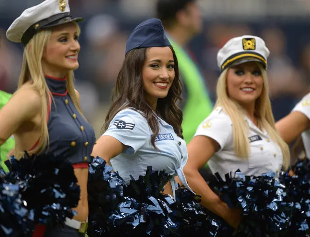 November 17, 2013; Houston, TX, USA; Houston Texans cheerleaders perform in military costumes as part of Salute to Service month festivities during the game against the Oakland Raiders at Reliant Stadium. (Photo by Kirby Lee/USA TODAY Sports)