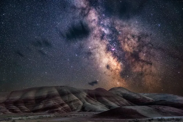 “Painted Hills”. With very little light pollution, the glimmering stars of the Milky Way bathe the colourful layers of the Painted Hills of Oregon in a natural glow. (Photo by Nicholas Roemmelt/Royal Observatory Greenwich’s Astronomy Photographer of the Year 2016/National Maritime Museum)