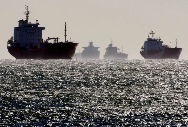 Oil and gas tankers sit anchored off the Fos-Lavera oil hub near Marseille, southeastern France, December 12, 2008. (Photo by Jean-Paul Pelissier/Reuters)