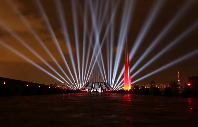 A view shows the illuminated Tsitsernakaberd memorial during an event commemorating victims of the 1915 mass killing of Armenians by Ottoman Turks in Yerevan, Armenia on April 24, 2020. (Photo by Vahram Baghdasaryan/Photolure via Reuters)