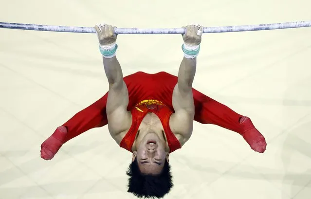 Boheng Zhang of China competes in the men’s artistic gymnastics world championships on November 6, 2022, which are taking place at M&S Bank Arena in Liverpool, Britain. (Photo by Andrew Boyers /Reuters)