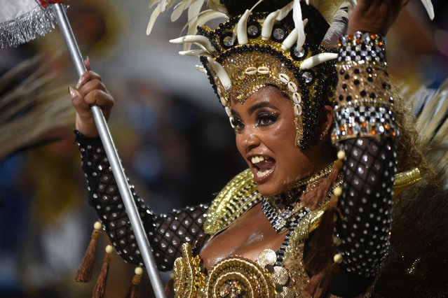 A reveller from Unidos de Padre Miguel samba school performs at the Sambadrome during Carnival in Rio de Janeiroon March 2, 2025. (Photo by Carla Carniel/Reuters)