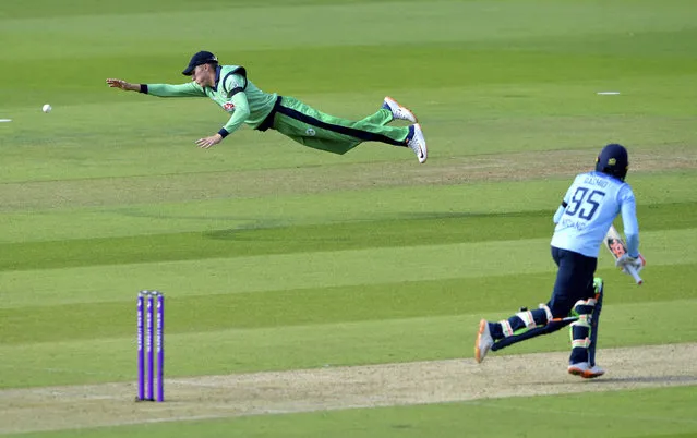 Ireland's Harry Tector, left, dives to make a catch but misses, during the third One Day International, ODI, cricket match between England and Ireland, at the Ageas Bowl in Southampton, England, Tuesday August 4, 2020. (Photo by Mike Hewitt/Pool via AP Photo)