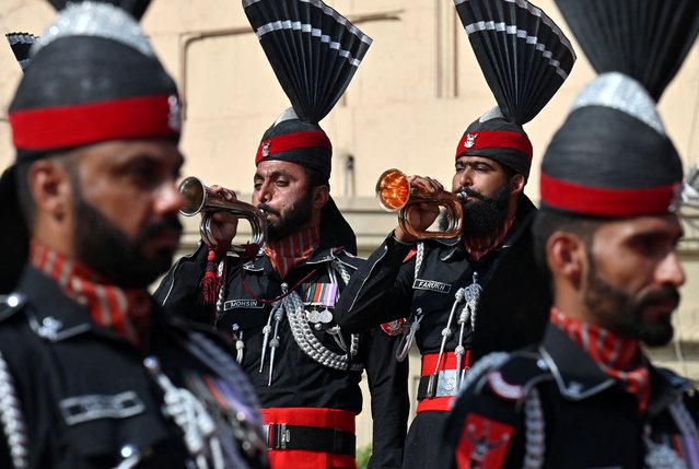 Pakistani Rangers perform during a ceremony to mark Youm-e-Tashakur (Thanksgiving Day) at the mausoleum of Allama Muhammad Iqbal, the National Poet of Pakistan in Lahore on May 16, 2025. (Photo by Arif Ali/AFP Photo)
