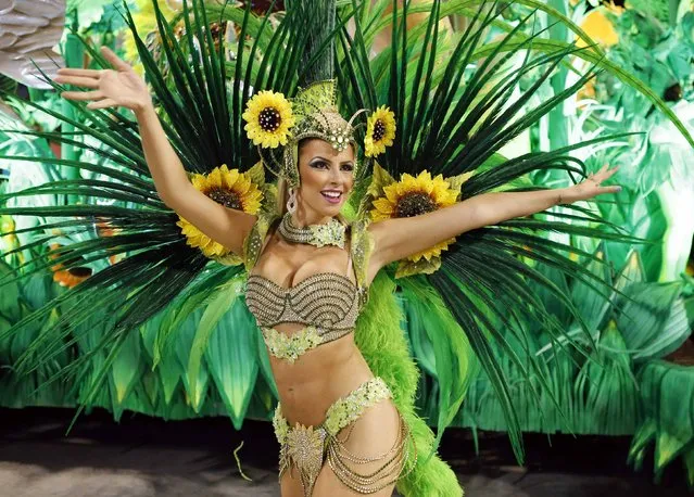 A reveller from the Vila Isabel samba school participates in the annual Carnival parade in Rio de Janeiro's Sambadrome February 12, 2013. (Photo by Sergio Moraes/Reuters)