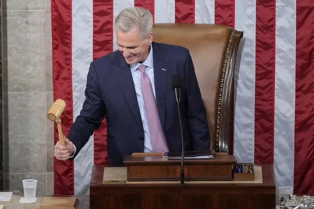 Incoming House Speaker Kevin McCarthy of Calif., holds the gavel after accepting it from House Minority Leader Hakeem Jeffries of N.Y., on the House floor at the U.S. Capitol in Washington, early Saturday, January 7, 2023. (Photo by Andrew Harnik/AP Photo)