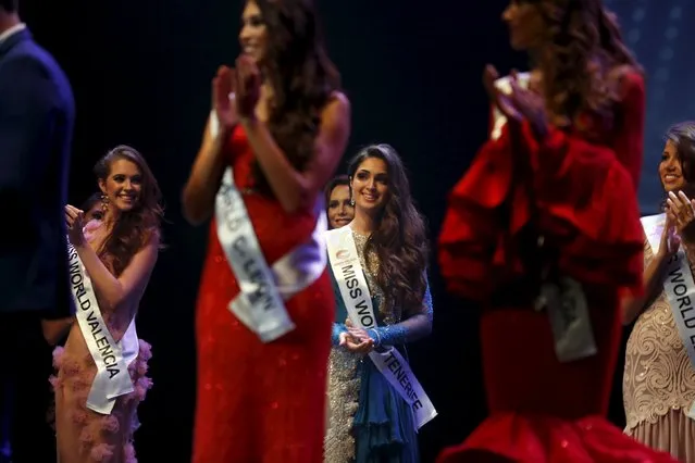 Angela Ponce, 24, (C, back) looks on as the finalists of  "Miss World Spain" pageant are announced during the pageant in Estepona, southern Spain, October 25, 2015. (Photo by Susana Vera/Reuters)