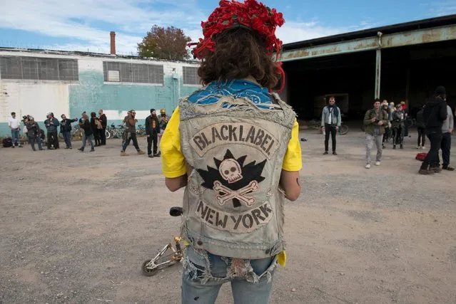 A man wears a vest lettered with the name of his bike club during "Bike Kill 12" in the Brooklyn borough of New York City, October 31, 2015. (Photo by Stephanie Keith/Reuters)
