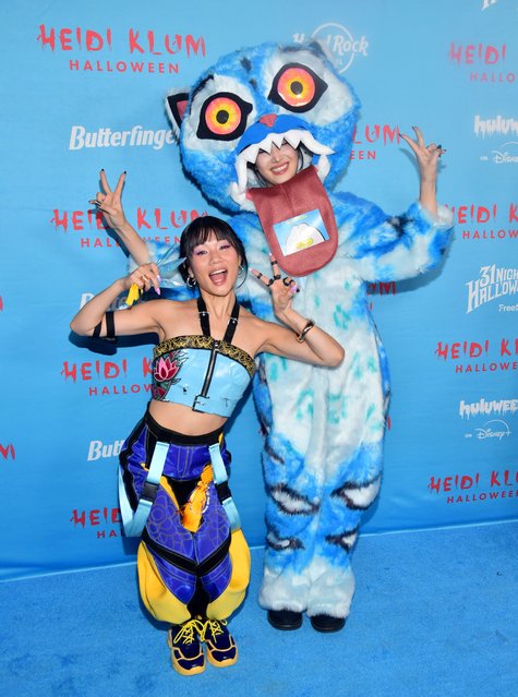 American rapper Rei Ami and South Korean singer EJAE attend the 2025 Heidi Klum Hallowe'en Party at Hard Rock Hotel New York on October 31, 2025 in New York City. (Photo by Stephen Lovekin/Rex Features/Shutterstock)