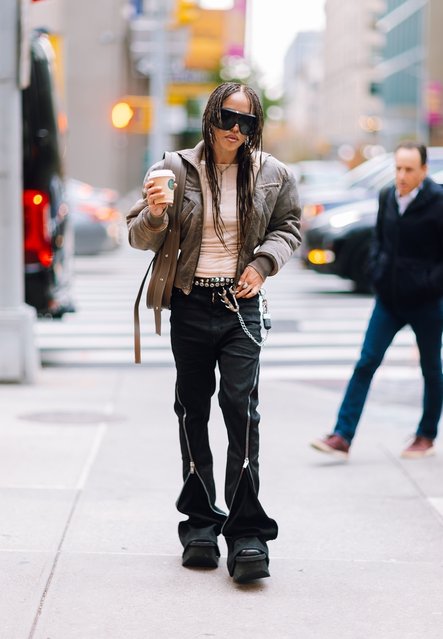 English singer-songwriter FKA Twigs spotted in New York on November 12, 2025 promoting her upcoming album, out this Friday, wearing a KNWLS jacket layered over a Margesherwood top, paired with Rick Owens pants and boots. She completed the look with Dsquared2 belts, a McQueen necklace, a Leo Prothman bag, and Philipp Plein sunglasses. (Photo by Backgrid USA)