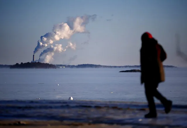 Plumes of steam blow from the Wyman station power plant on Cousins Island in Yarmouth, Maine, where the temperature at dawn was several degrees below zero, Thursday, January 8, 2015. Dangerously cold air has sent temperatures plummeting around the U.S. (Photo by Robert F. Bukaty/AP Photo)