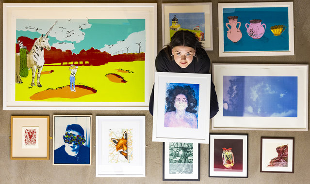 Astrid Turner, a co-ordinator at Edinburgh Printmakers, with some of the 125 artworks by 124 artists to be shown at the Our Shared World exhibition from Friday, November 28, 2025 until March 15. (Photo by Rich Dyson Photography)