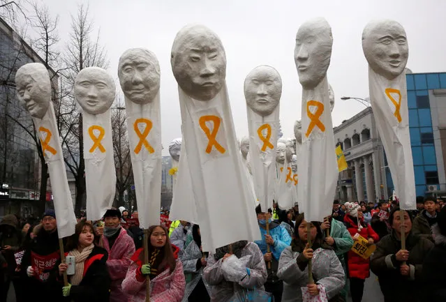 Protesters march calling for South Korean President Park Geun-hye to step down in Seoul, South Korea, November 26, 2016. (Photo by Kim Kyung-Hoon/Reuters)