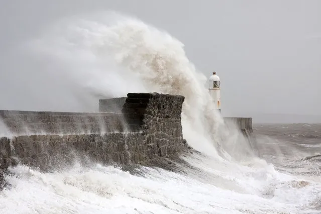 Large waves crash over the breakwater this morning, as gales of 55mph hit the region in Porthcawl, Wales, United Kingdom on March 13, 2023. (Photo by Andrew Bartlett/Cover Images)