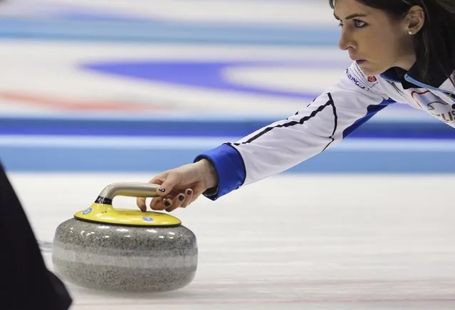 Scotland's skip Eve Muirhead delivers a stone during her team's curling round robin game against Denmark at the World Women's Curling Championships in Sapporo March 14, 2015. (Photo by Thomas Peter/Reuters)