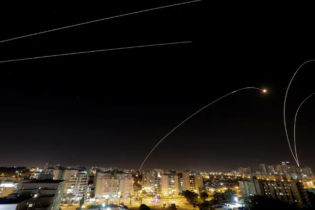 A general view of the Israeli city of Ashkelon, as an Iron Dome anti-missile fires near the Israeli side of the Israel-Gaza border, November 12, 2018. (Photo by Amir Cohen/Reuters)