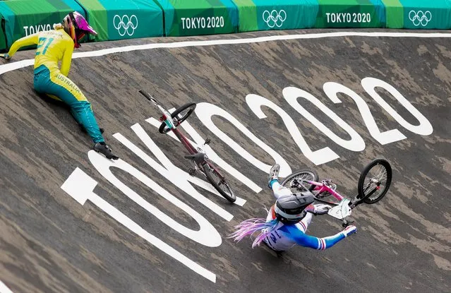 Lauren Reynolds of Australia (L) and Axelle Etienne of France crash during the Women's BMX Racing Run on day seven of the Tokyo 2020 Olympic Games at Ariake Urban Sports Park on July 30, 2021 in Tokyo, Japan. (Photo by Matthew Childs/Reuters)
