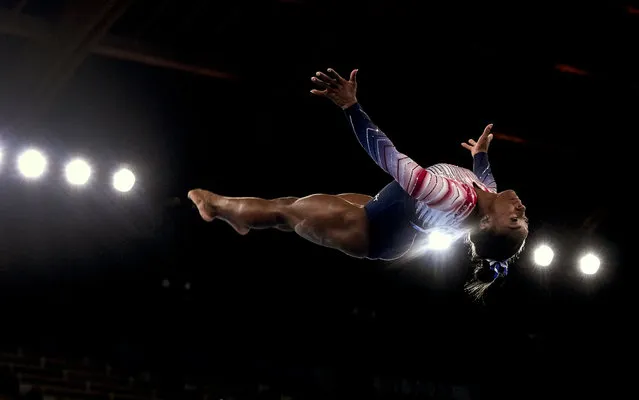 Gymnast Simone Biles of Team United States flips through the air as performs her dismount during the Tokyo 2020 Olympic Games Women's Gymnastics Balance Beam Final at Ariake Gymnastics Center on Tuesday, August 3, 2021. (Photo by Toni L. Sandys/The Washington Post)