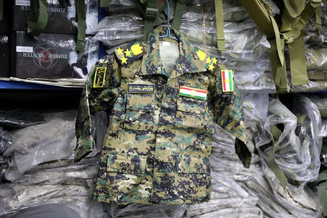 A female military uniform is seen in a store in Erbil, Iraq January 24, 2017. (Photo by Marius Bosch/Reuters)