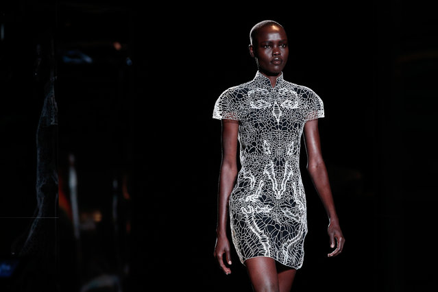 A model wears a creation for Iris Van Herpen's Fall-Winter 2016-2017 ready to wear fashion collection presented in Paris, Tuesday, March 8, 2016. (Photo by Thibault Camus/AP Photo)
