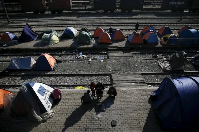 Tents are set at Idomeni train station next to a makeshift camp for refugees and migrants at the Greek-Macedonian border near the village of Idomeni, Greece, March 19, 2016. (Photo by Alkis Konstantinidis/Reuters)