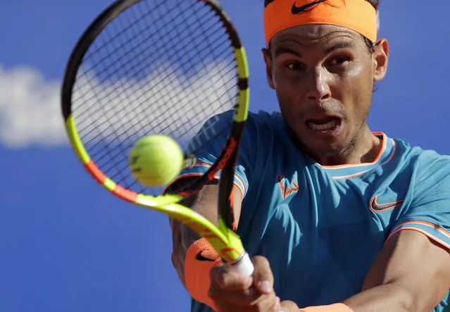 Spain's Rafael Nadal returns the ball to Austria's Dominic Thiem during their semifinal match at the Barcelona Open Tennis Tournament in Barcelona, Spain, Saturday, April 27, 2019. (Photo by Manu Fernandez/AP Photo)