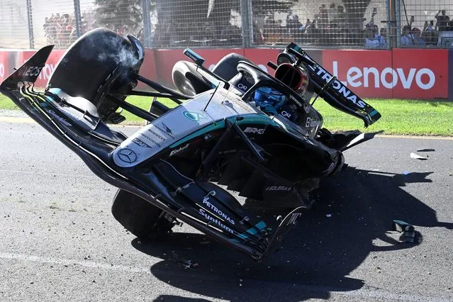 Mercedes' British driver George Russell crashes during during the Australian Formula One Grand Prix at Albert Park Circuit in Melbourne on March 24, 2024. (Photo by Paul Crock/AFP Photo)